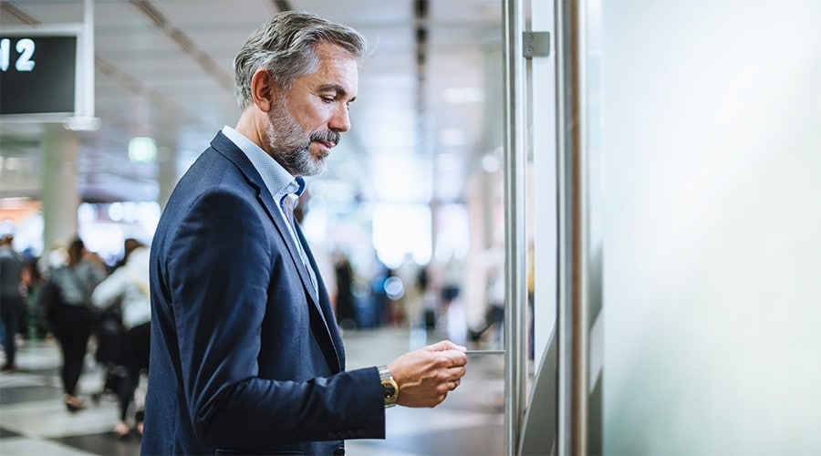 Business person at an ATM